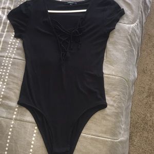 All black laced down string body suit